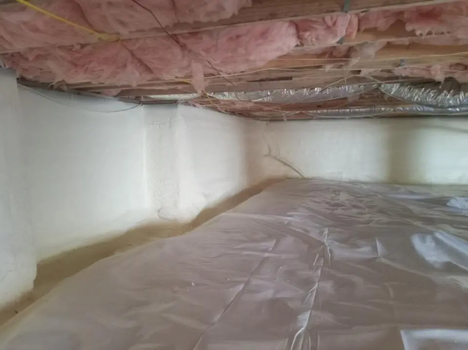 Crawl space encapsulation with closed-cell spray foam for Commercial Roof Restoration in Malta